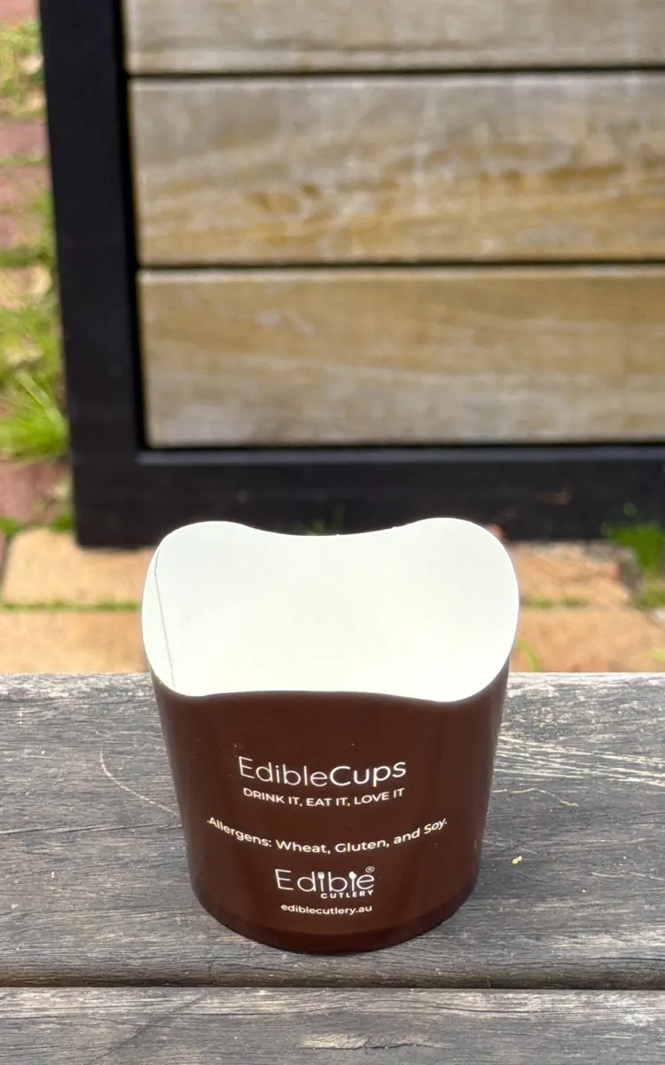Empty paper sleeve, cup fully eaten